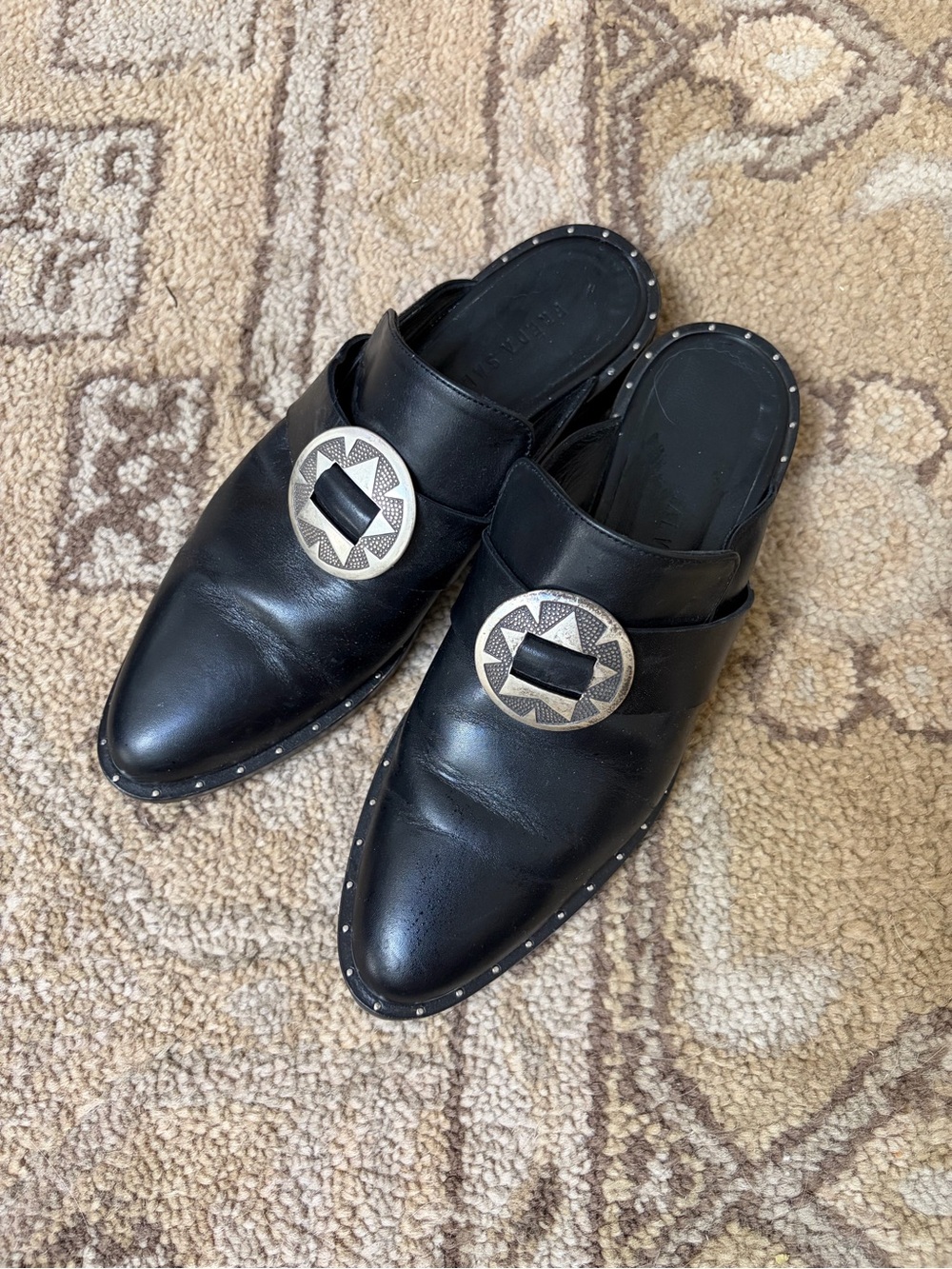 Freda Salvador Black Leather Slip-On Mules with Decorative Concho